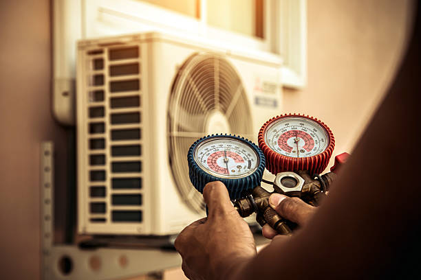 Professional Hvac technician working in Miamiville, OH